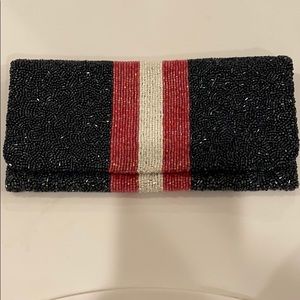Moyna sparkle stripe clutch